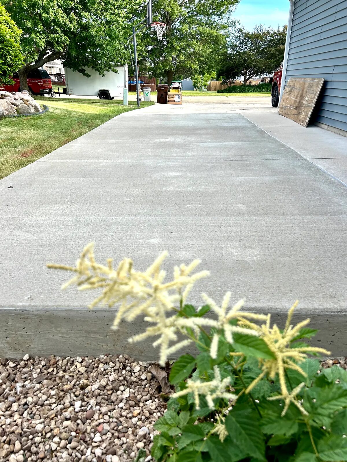 Newly poured concrete driveway alongside a home in northern Illinois